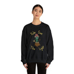 Yule see  the Light Unisex Heavy Blend™ Crewneck Sweatshirt