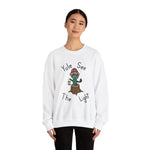 Yule see  the Light Unisex Heavy Blend™ Crewneck Sweatshirt